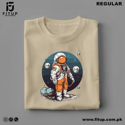 Experience cosmic cool with the "Astronaut On Rocks Regular T-Shirt" by Fitup. This space t-shirt features a unique astronaut design perched on rugged rocks, blending earthly elements with a celestial vibe. Perfect for those who love the simplicity of a regular t-shirt, it delivers timeless comfort and stellar style.